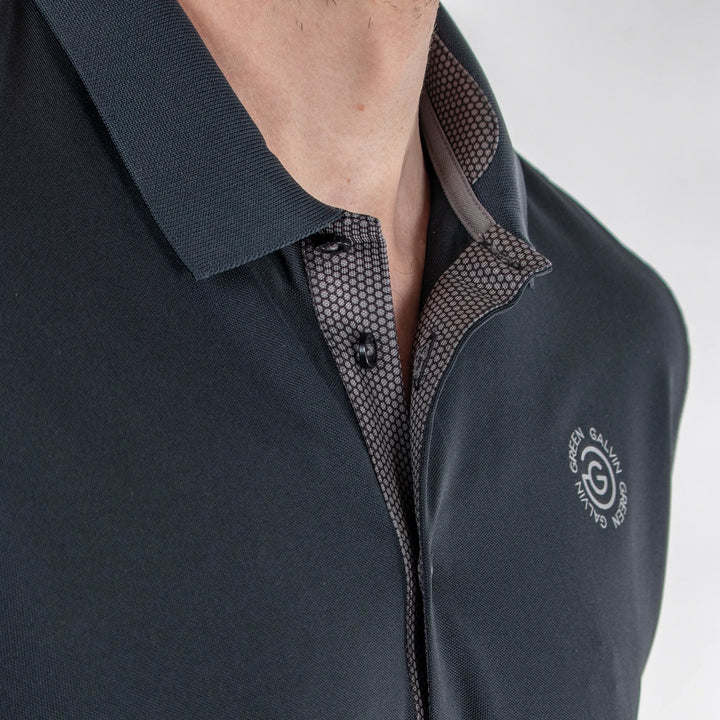 Max Tour is a Breathable short sleeve golf shirt for Men in the color Black(3)