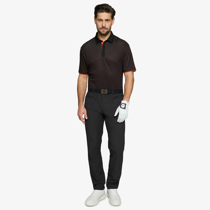 Medley is a Breathable short sleeve golf shirt for Men in the color Black/Orange(2)