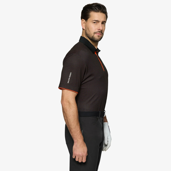 Medley is a Breathable short sleeve golf shirt for Men in the color Black/Orange(3)