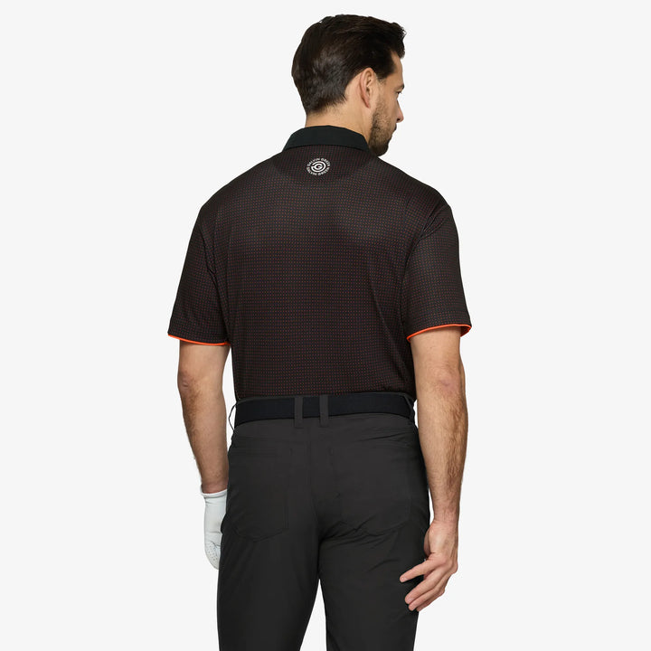 Medley is a Breathable short sleeve golf shirt for Men in the color Black/Orange(4)
