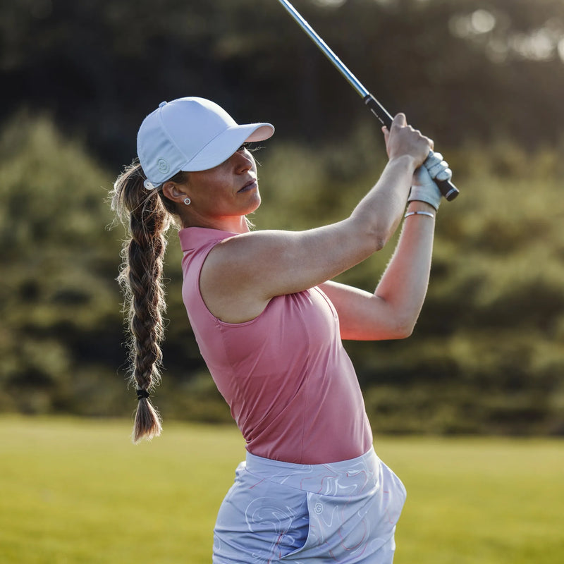 Meg is a Breathable short sleeve golf shirt for Women in the color Coral/White (7)