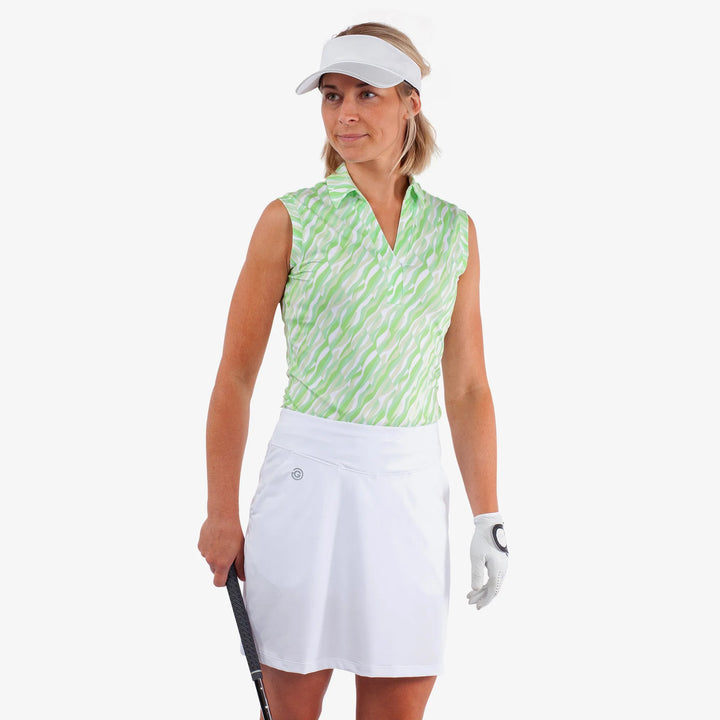 Melissa is a Breathable sleeveless golf shirt for Women in the color Fresh Green/White(1)