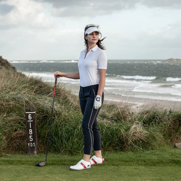 Melody is a Breathable short sleeve golf shirt for Women in the color White(9)