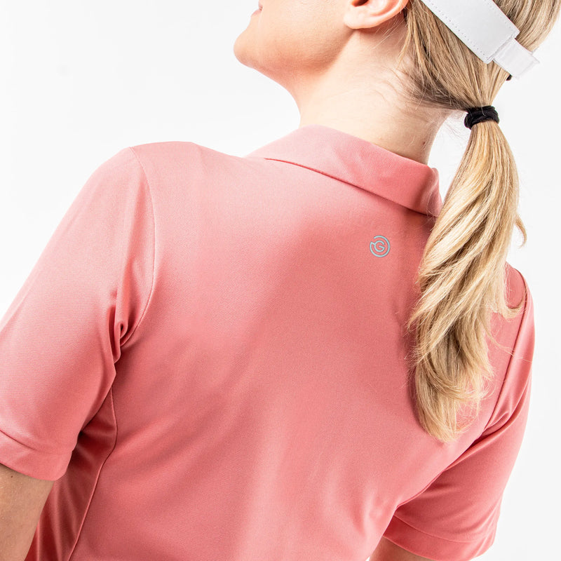 Melody is a Breathable short sleeve golf shirt for Women in the color Coral(5)