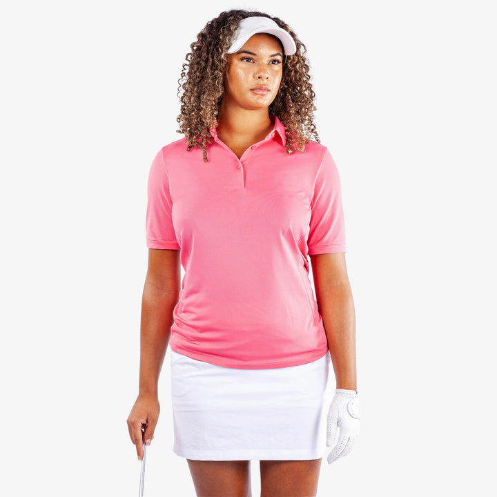 Melody is a Breathable short sleeve golf shirt for Women in the color Camelia Rose(1)