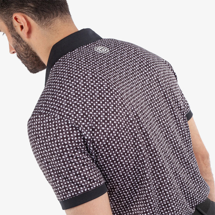 Melvin is a Breathable short sleeve golf shirt for Men in the color Black/White(5)