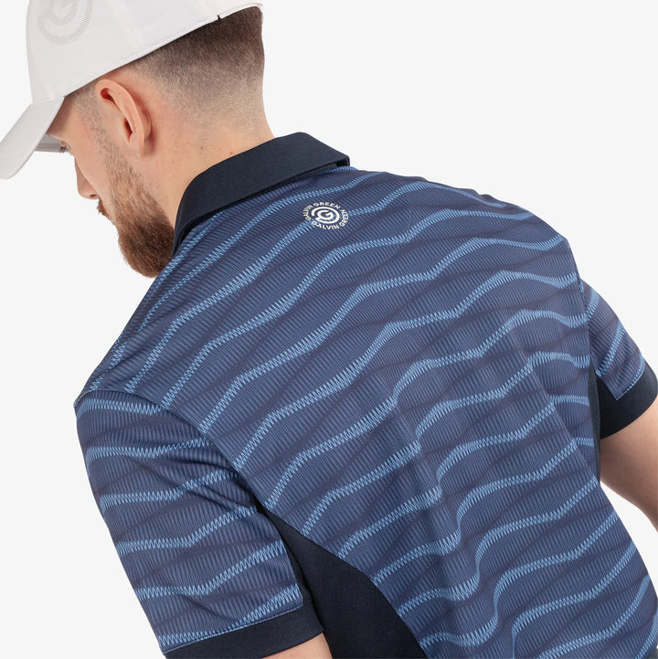 Merlin is a Breathable short sleeve golf shirt for Men in the color Navy/Blue(4)
