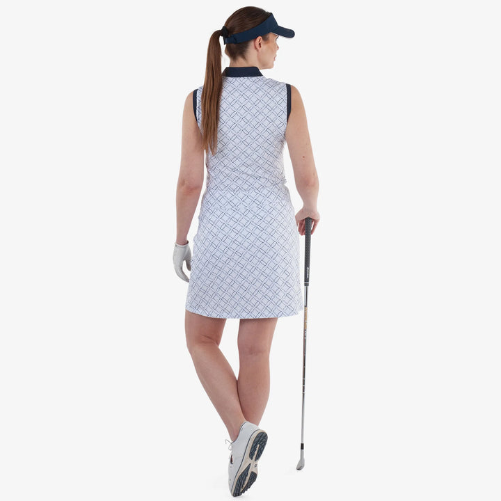 Mia is a Breathable sleeveless golf shirt for Women in the color White/Navy(5)