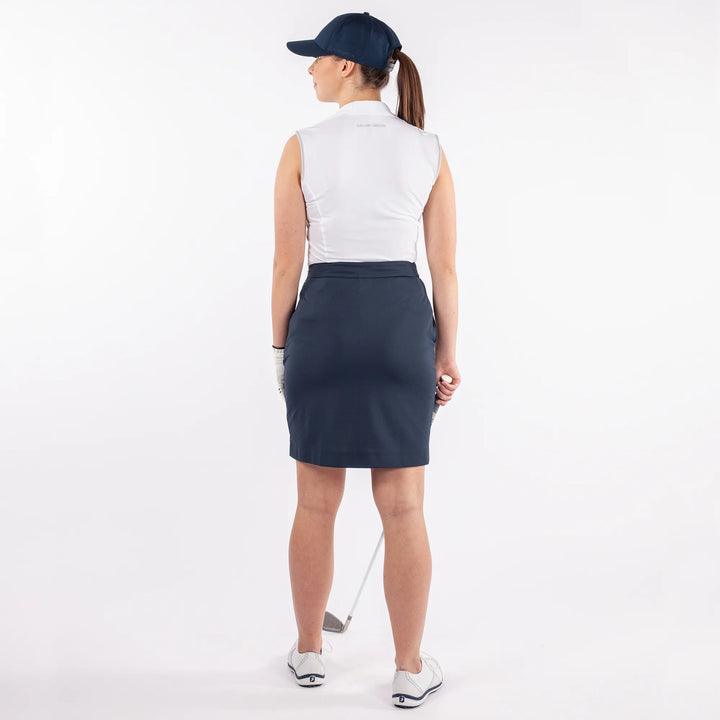 Mila is a Breathable sleeveless golf shirt for Women in the color White(4)