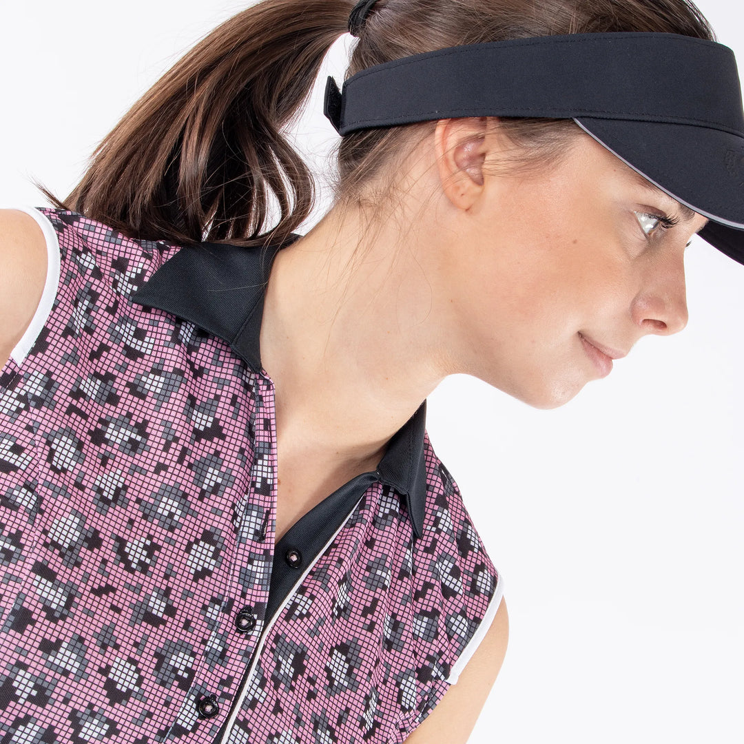 Mila is a Breathable sleeveless golf shirt for Women in the color Sugar Coral(4)