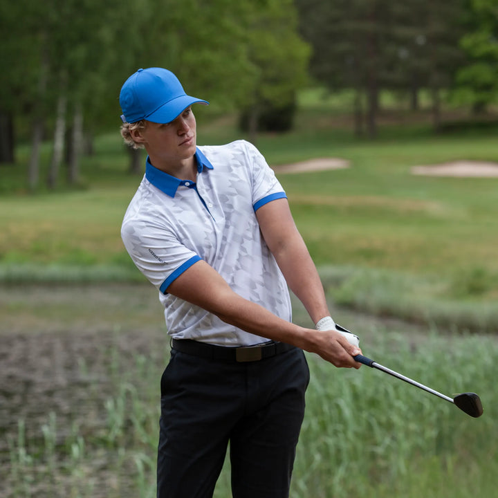 Miles is a Breathable short sleeve golf shirt for Men in the color White/Royal Blue(9)