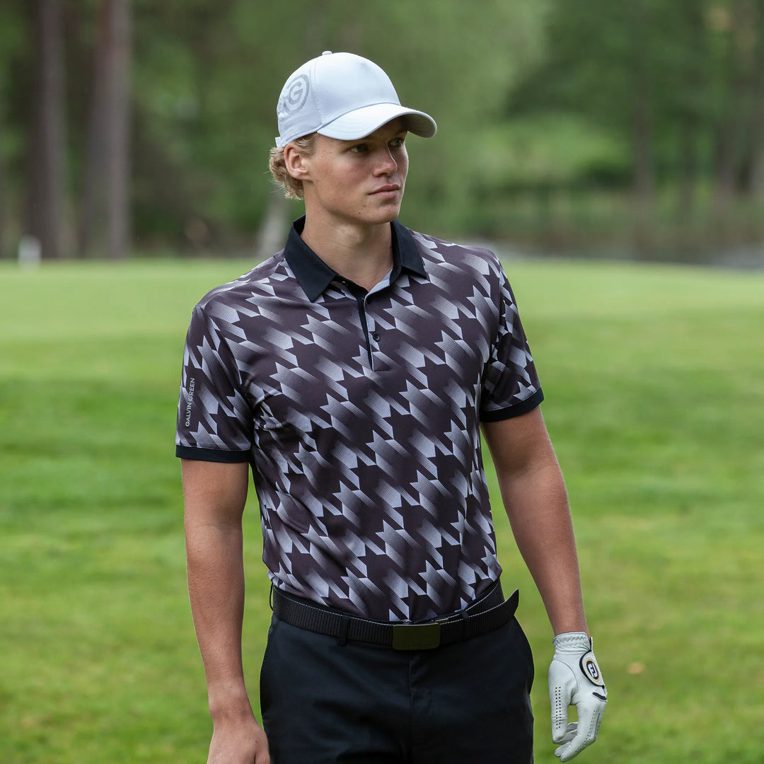 Miles is a Breathable short sleeve golf shirt for Men in the color Black/White(8)