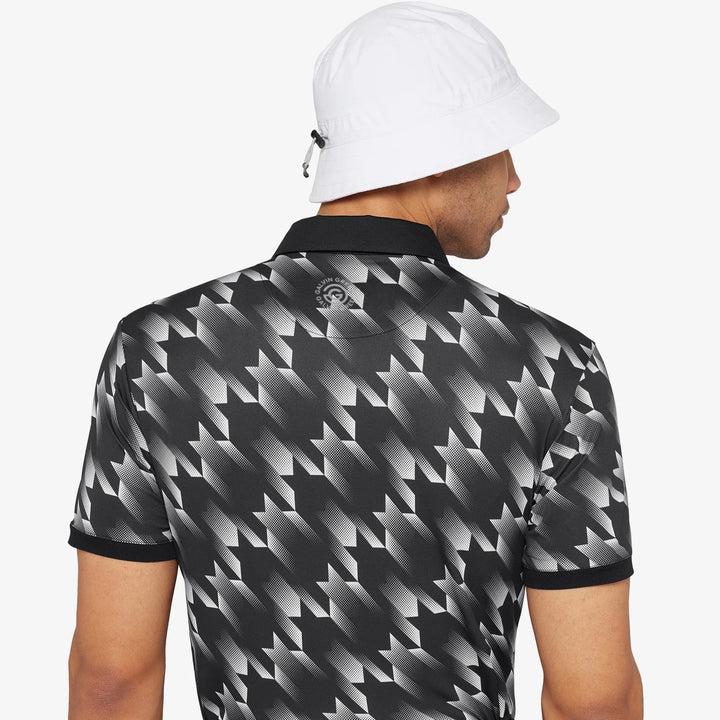 Miles is a Breathable short sleeve golf shirt for Men in the color Black/White(5)