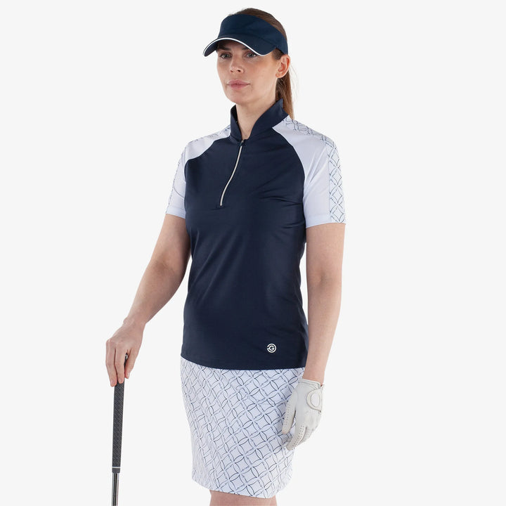 Miley is a Breathable short sleeve golf shirt for Women in the color Navy/White(1)
