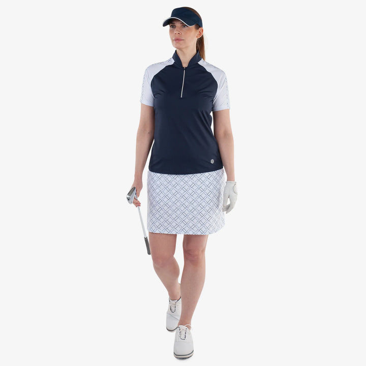 Miley is a Breathable short sleeve golf shirt for Women in the color Navy/White(3)