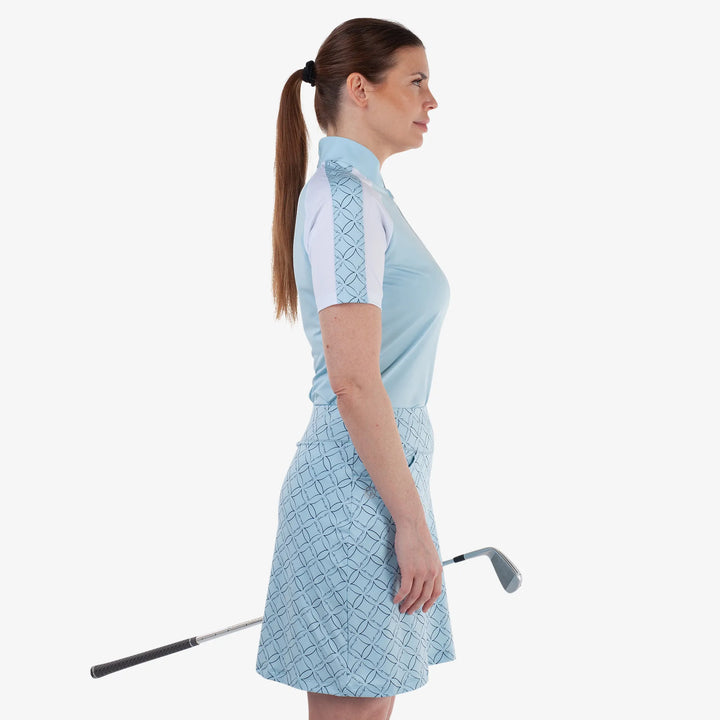 Miley is a Breathable short sleeve golf shirt for Women in the color Crystal Blue/White(3)