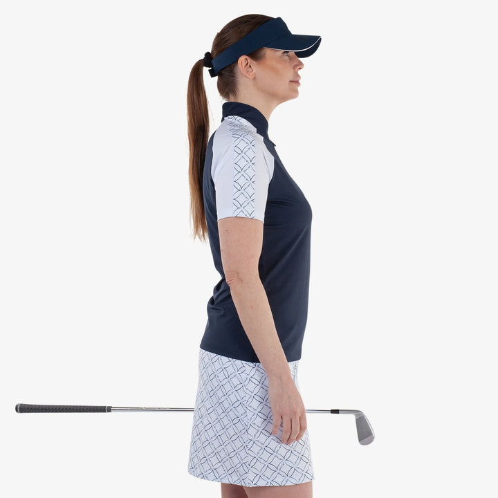 Miley is a Breathable short sleeve golf shirt for Women in the color Navy/White(4)