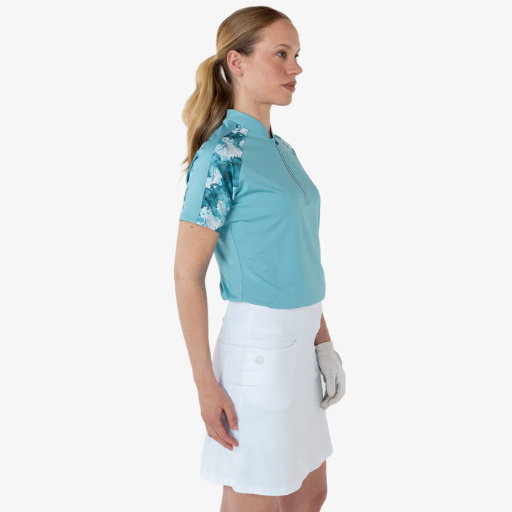 Miley is a Breathable short sleeve golf shirt for Women in the color Delphinium Blue(4)