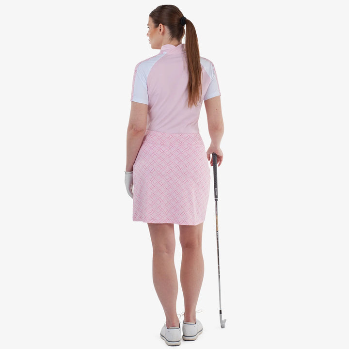 Miley is a Breathable short sleeve golf shirt for Women in the color Pink/White(5)