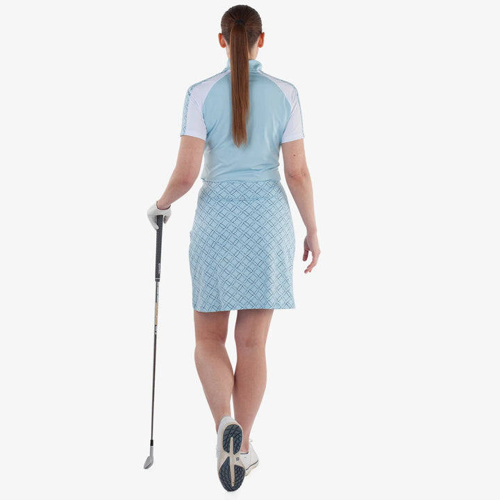 Miley is a Breathable short sleeve golf shirt for Women in the color Crystal Blue/White(5)