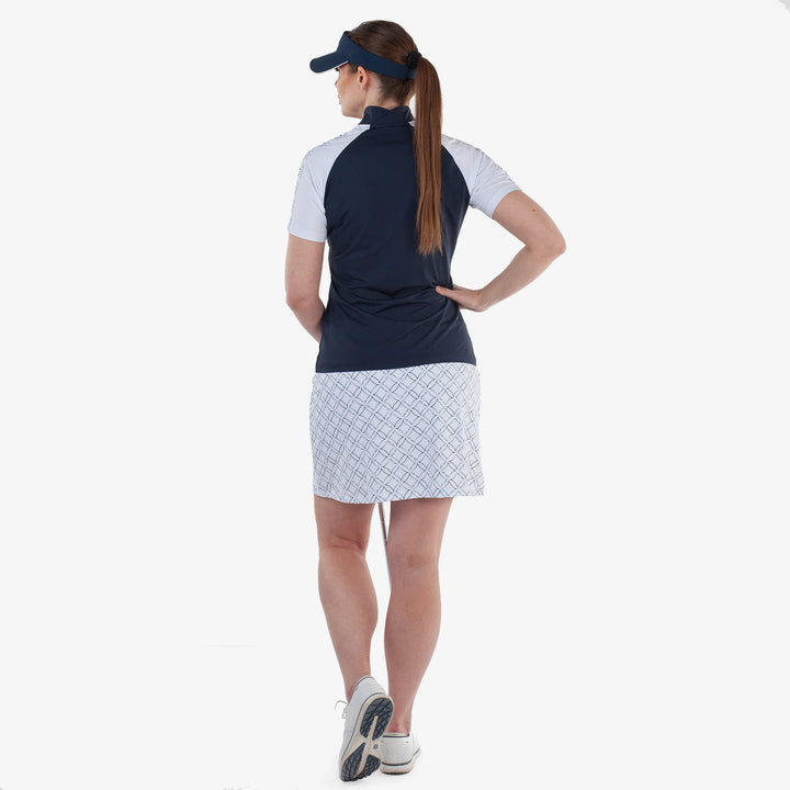 Miley is a Breathable short sleeve golf shirt for Women in the color Navy/White(6)
