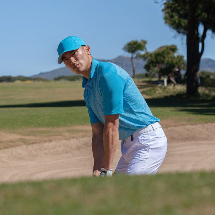 Mile is a Breathable short sleeve golf shirt for Men in the color Aqua/White (8)