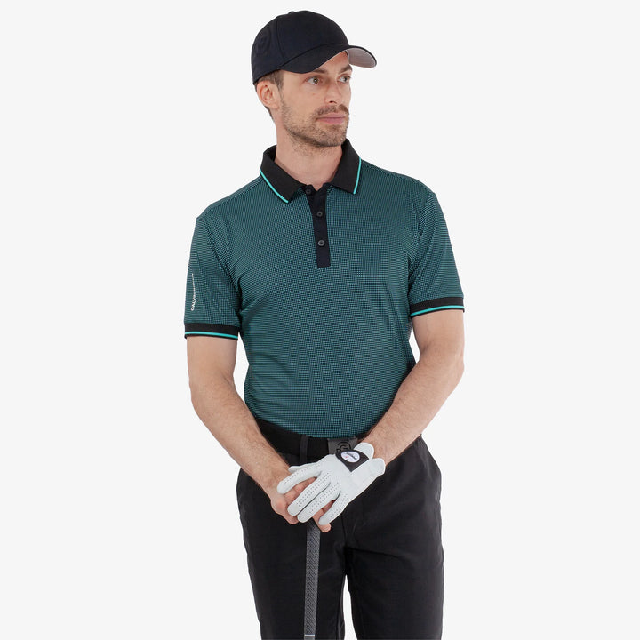 Miller is a Breathable short sleeve golf shirt for Men in the color Black/Atlantis Green(1)