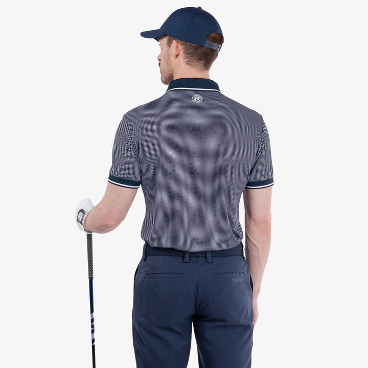 Miller is a Breathable short sleeve golf shirt for Men in the color Navy/White(5)