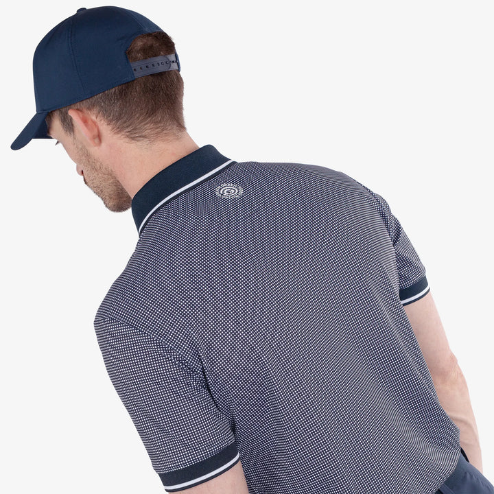 Miller is a Breathable short sleeve golf shirt for Men in the color Navy/White(4)