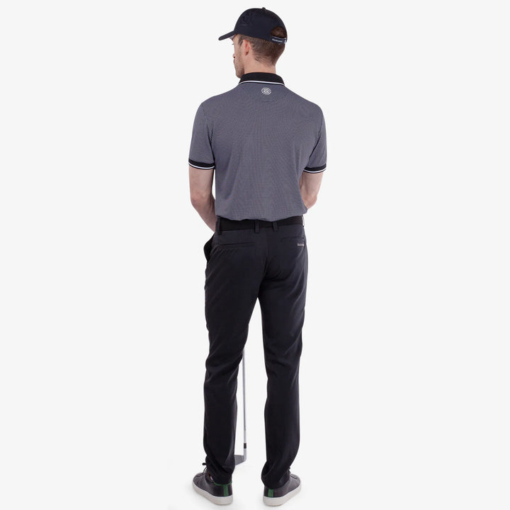 Miller is a Breathable short sleeve golf shirt for Men in the color Black/White(6)