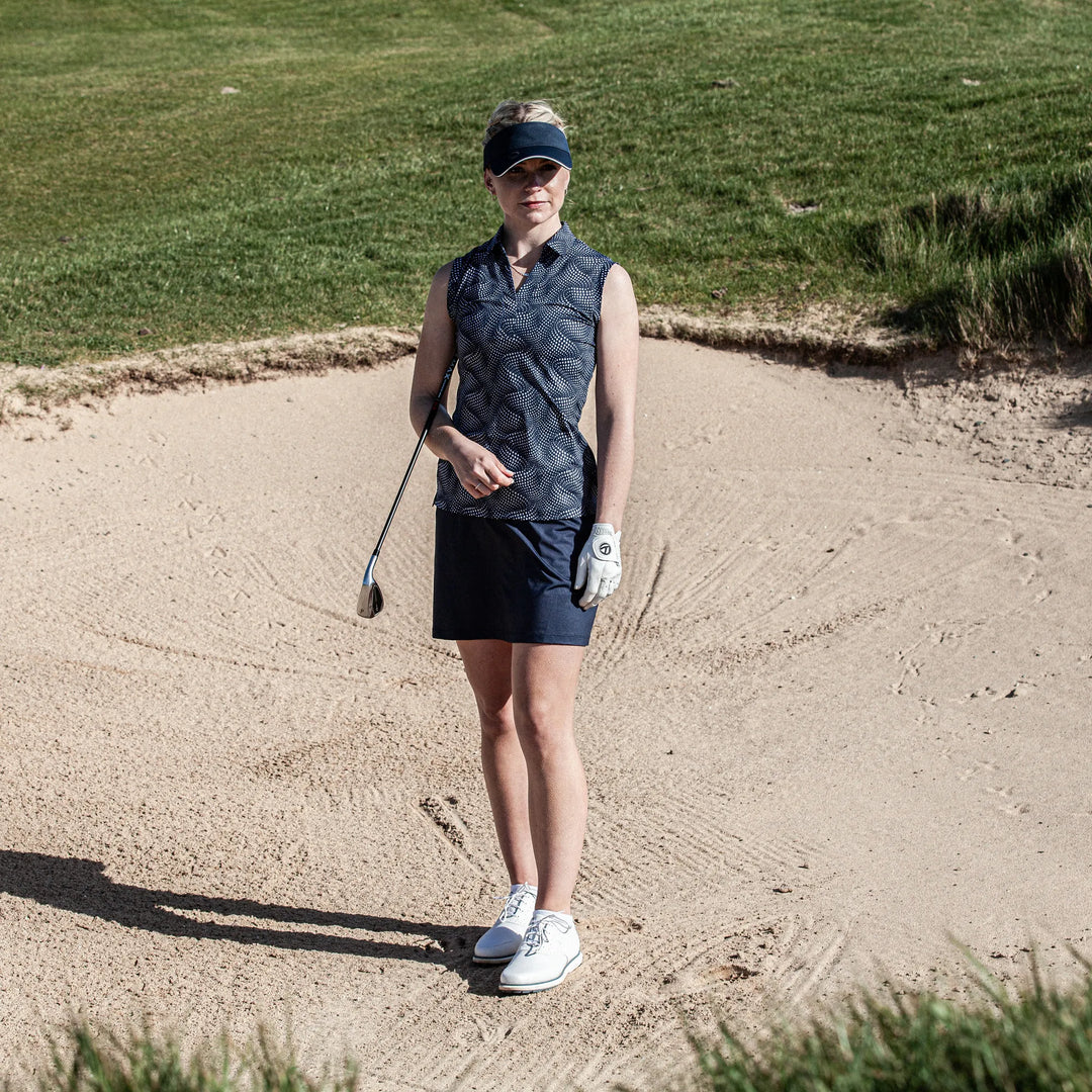 Minnie is a Breathable Sleeveless Golf Shirt for Women in the color Black/White(8)