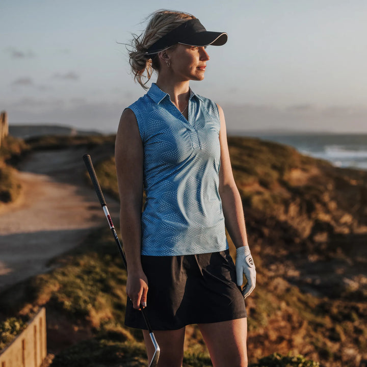 Minnie is a Breathable Sleeveless Golf Shirt for Women in the color Alaskan Blue/White(9)