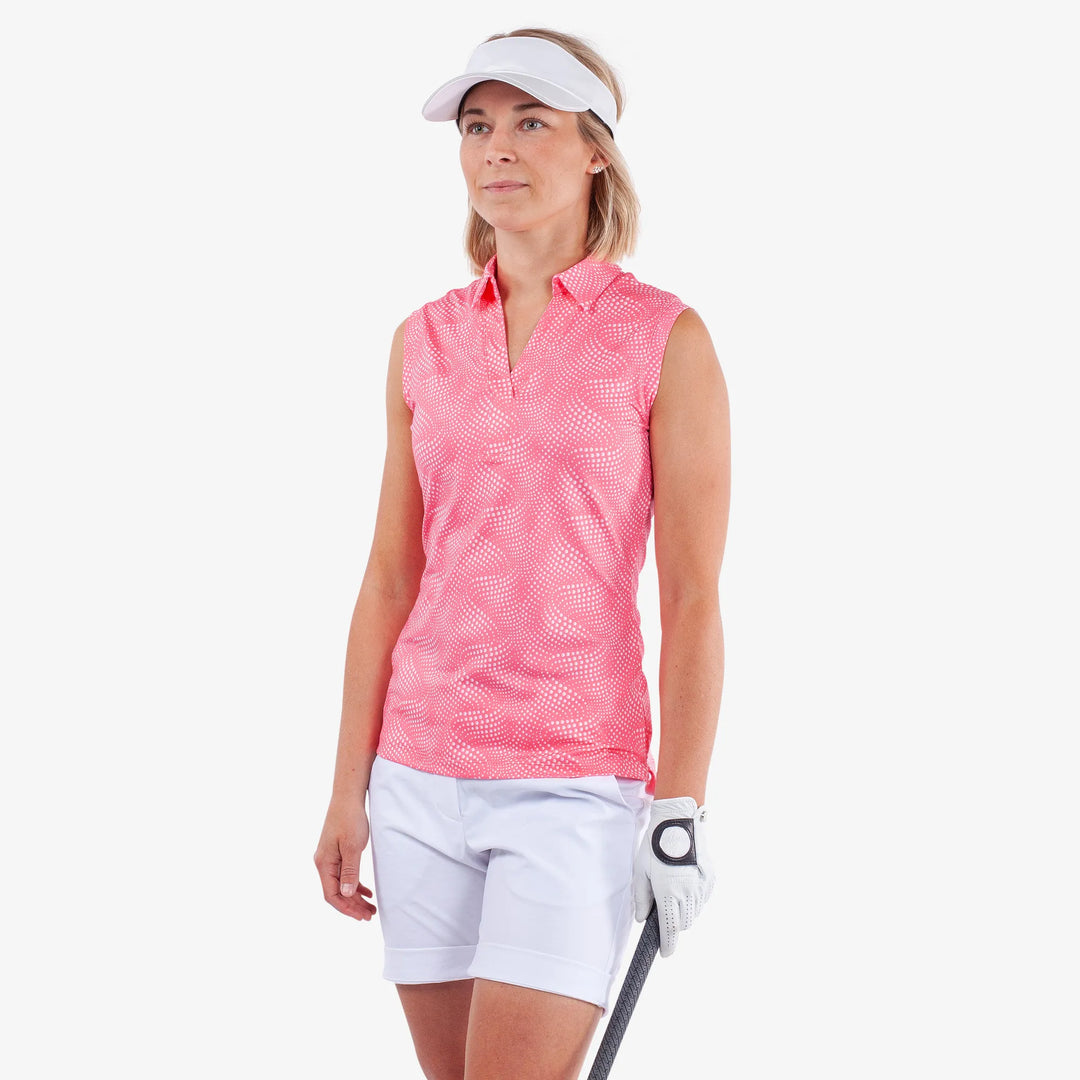 Minnie is a Breathable Sleeveless Golf Shirt for Women in the color Camelia Rose/White(1)
