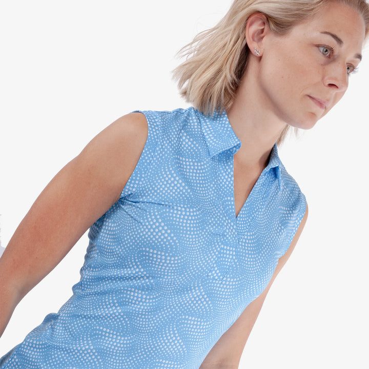 Minnie is a Breathable Sleeveless Golf Shirt for Women in the color Alaskan Blue/White(3)