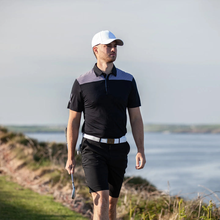 Miran is a Breathable short sleeve golf shirt for Men in the color Black/Royal Blue(8)