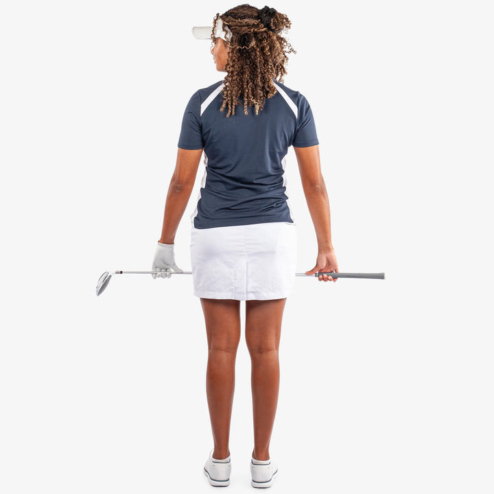 Mirelle is a Breathable short sleeve golf shirt for Women in the color Navy/White(6)
