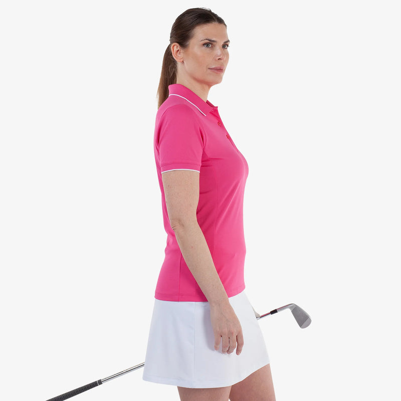 Molly is a Breathable short sleeve golf shirt for Women in the color Fuchsia(3)