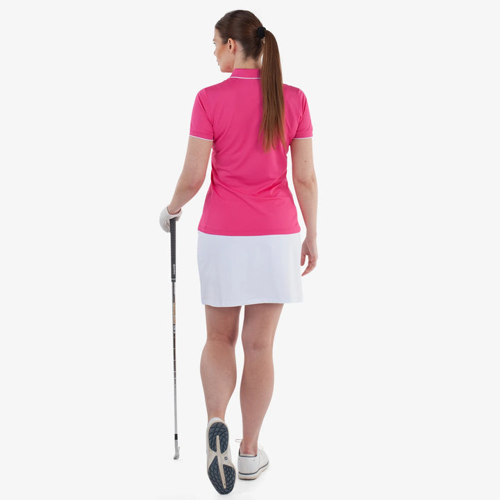 Molly is a Breathable short sleeve golf shirt for Women in the color Fuchsia(6)