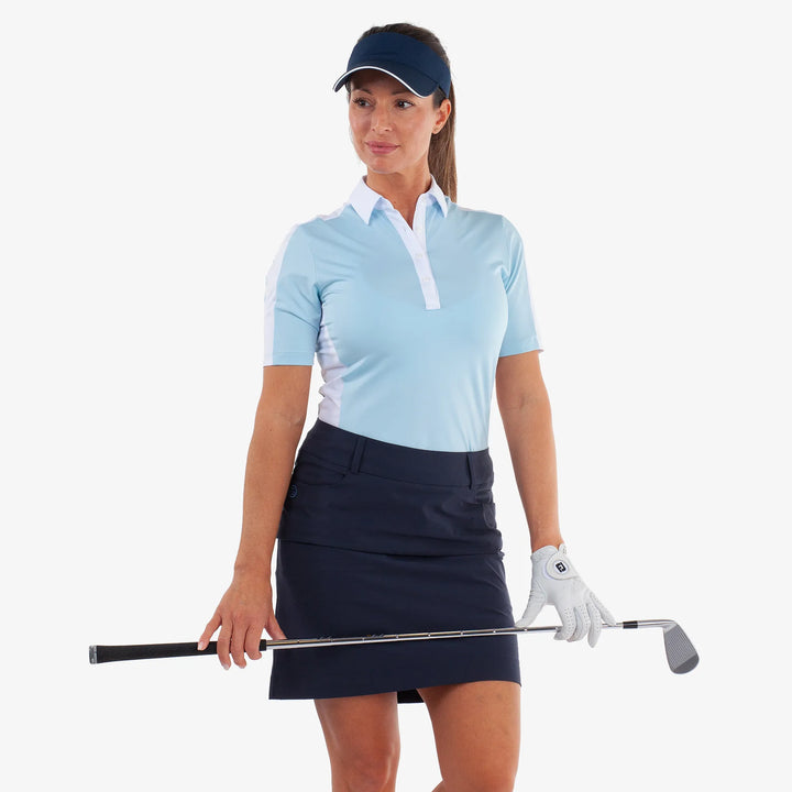 Mona is a Breathable short sleeve golf shirt for Women in the color Crystal Blue/White(1)