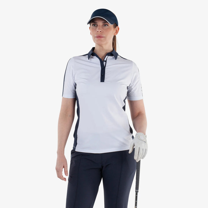 Mona is a Breathable short sleeve golf shirt for Women in the color White/Navy(1)
