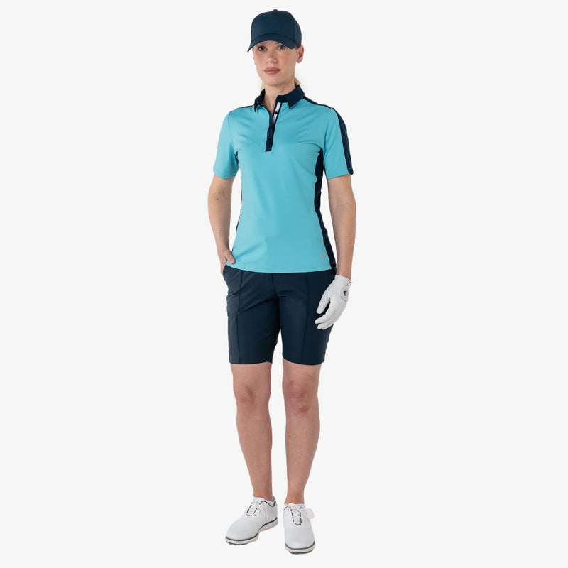 Mona is a Breathable short sleeve golf shirt for Women in the color Delphinium Blue/Navy(2)
