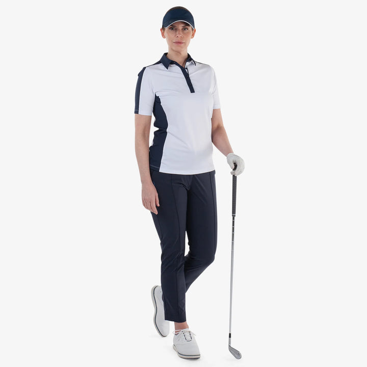 Mona is a Breathable short sleeve golf shirt for Women in the color White/Navy(2)