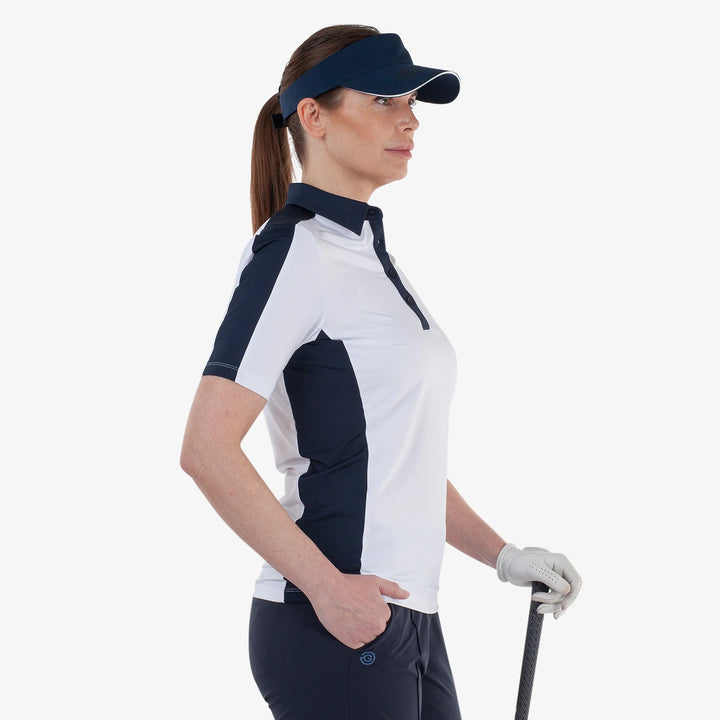 Mona is a Breathable short sleeve golf shirt for Women in the color White/Navy(3)