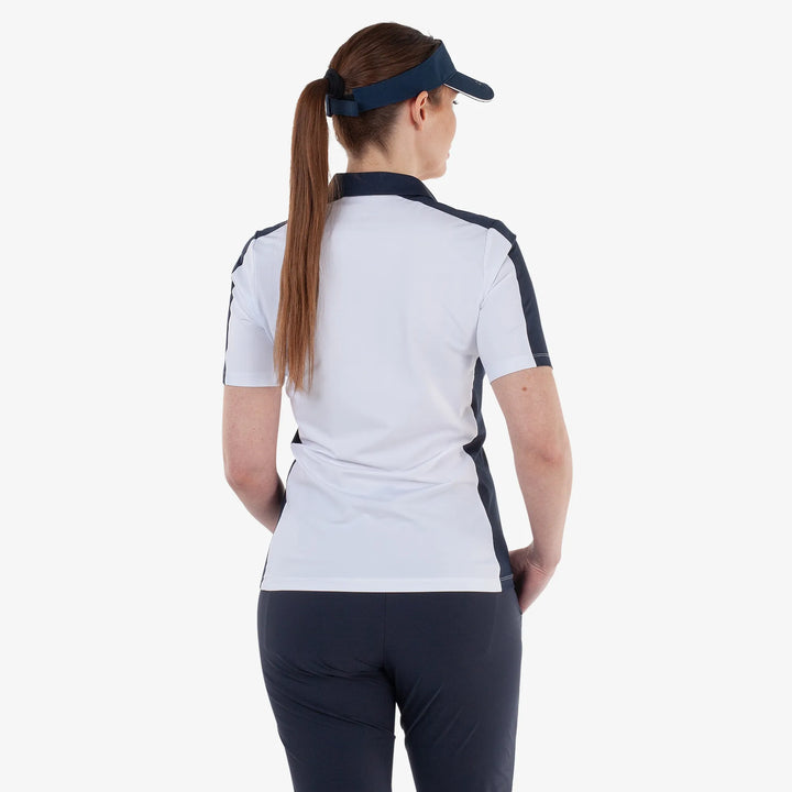 Mona is a Breathable short sleeve golf shirt for Women in the color White/Navy(4)