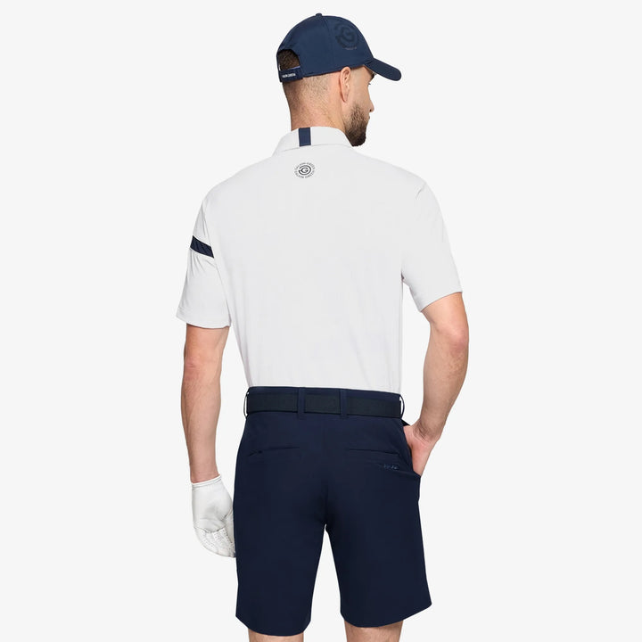 Morley is a Breathable short sleeve golf shirt for Men in the color White/Navy(4)