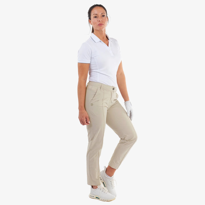 Nea is a Breathable golf pants for Women in the color Sand(2)