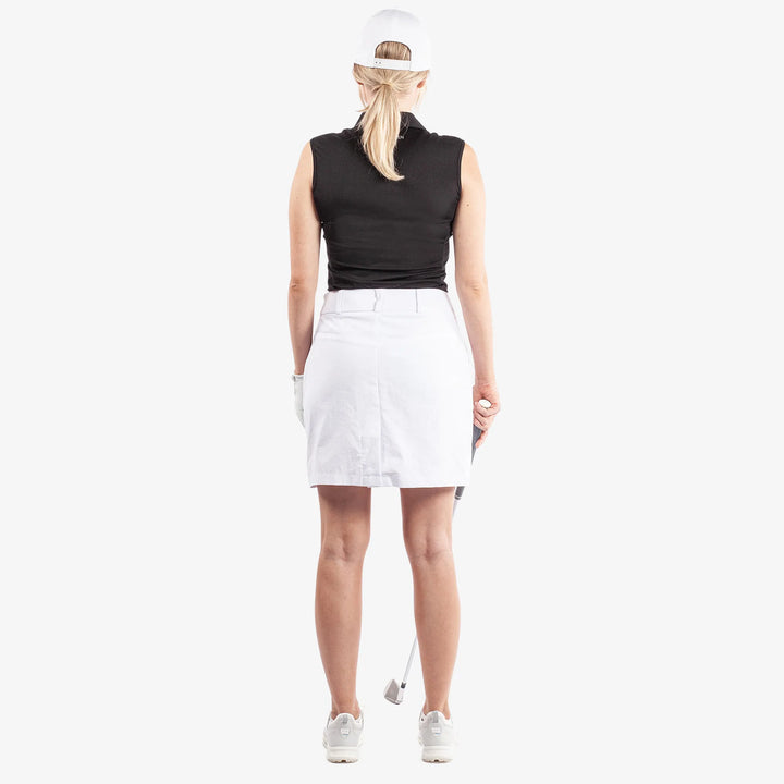 Nessa is a Breathable golf skirt with inner shorts for Women in the color White(6)