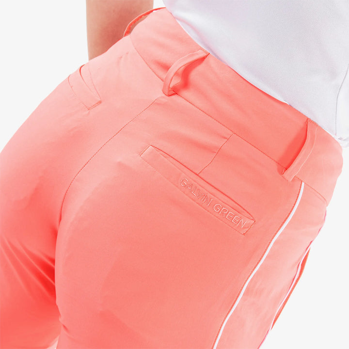 Nicole is a Breathable golf pants for Women in the color Coral/White (5)