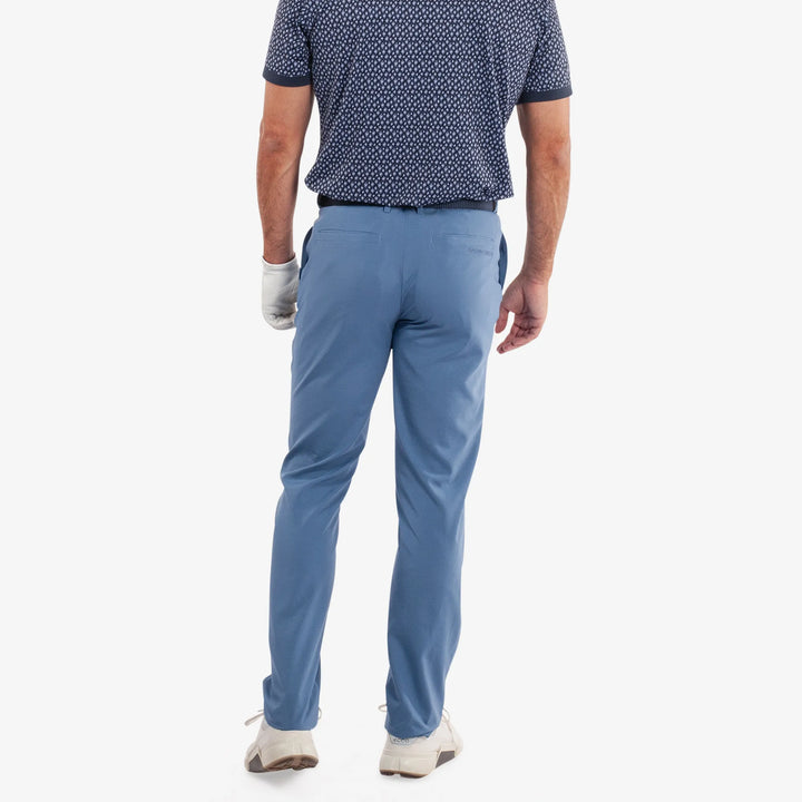 Nixon is a Breathable golf pants for Men in the color Moonlight Blue(4)