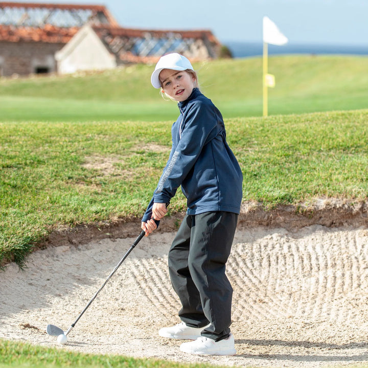 Raz is a Insulating golf mid layer for Juniors in the color Navy(9)